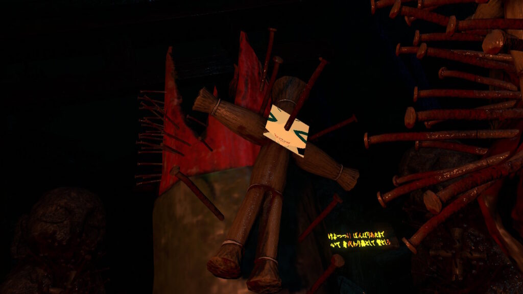 デココの顔に釘が刺さった藁人形